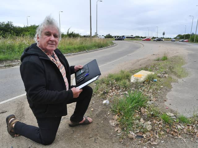 Mark Fishpool checking out the state of the A47 at junction with Welland Road.