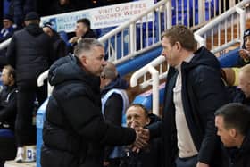 Peterborough United manager Darren Ferguson shakes hands with Charlton Athletic manager. Photo: Joe Dent.