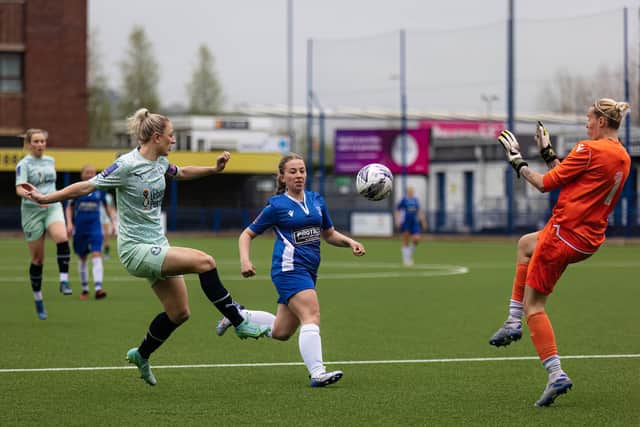 Keir Perkins (left) in action for Posh at Leek. Photo: Ruby Red Photography