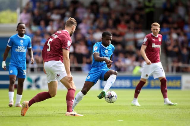 Kwame Poku of Peterborough United in action against Northampton Town. Photo: Joe Dent.