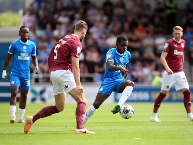 Kwame Poku of Peterborough United in action against Northampton Town. Photo: Joe Dent.