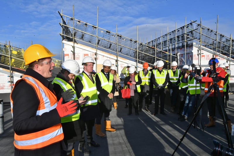 Guests at the topping out ceremony at the ARU Peterborough's Living Lab phase 3 building at Bishop's Road, Peterborough.