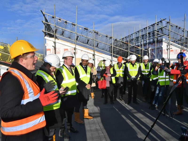 Guests at the topping out ceremony at the ARU Peterborough's Living Lab phase 3 building at Bishop's Road, Peterborough.