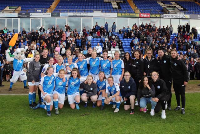 Posh Women players and staff celebrate their cup success. Photo: Joe Dent/theposh.com