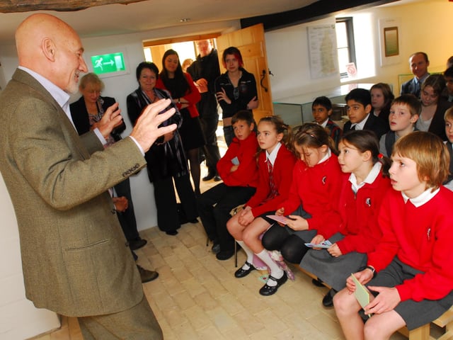 Sir Patrick speaking to schoolchildren.