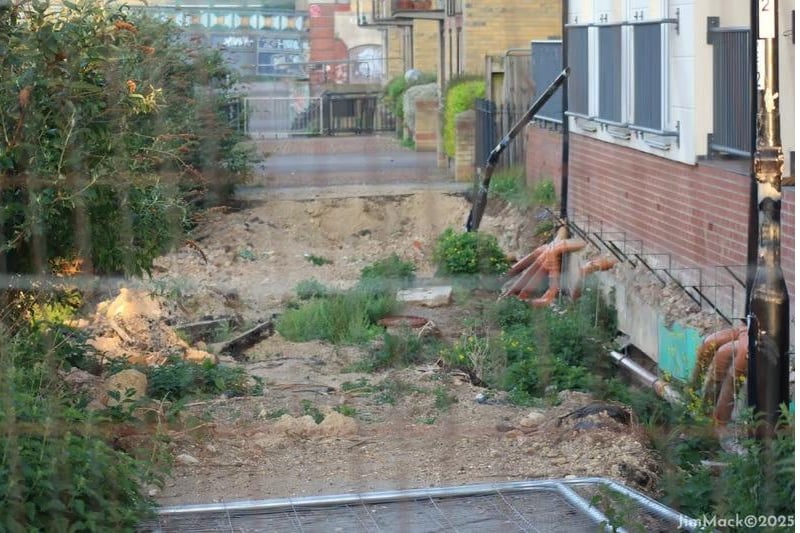 The huge sink hole at Henry Penn Walk. Photo: Jim Mack