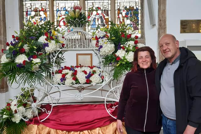 Edita Rimkute's striking Royal stagecoach display has been made with red, white and blue hydrangeas, and crowned with symbolic sugarbushes (protea).
