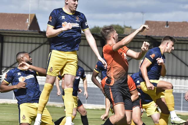 Action from Peterborough Sports (orange) v Spennymoor Town. Photo: David Lowndes.
