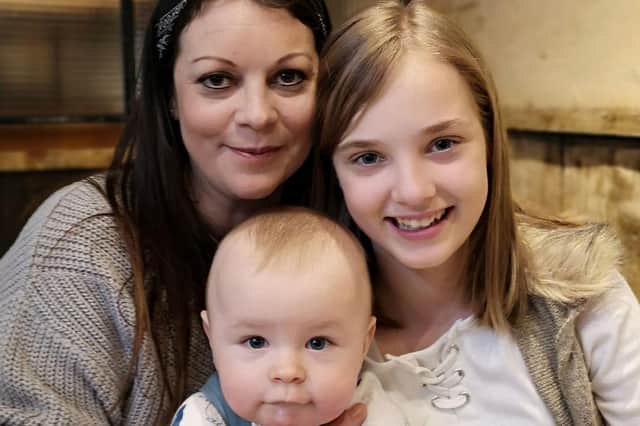 Ingenious Gifts' owner Michelle Baker (left) with her children Ruby (right) and Lewis (centre).