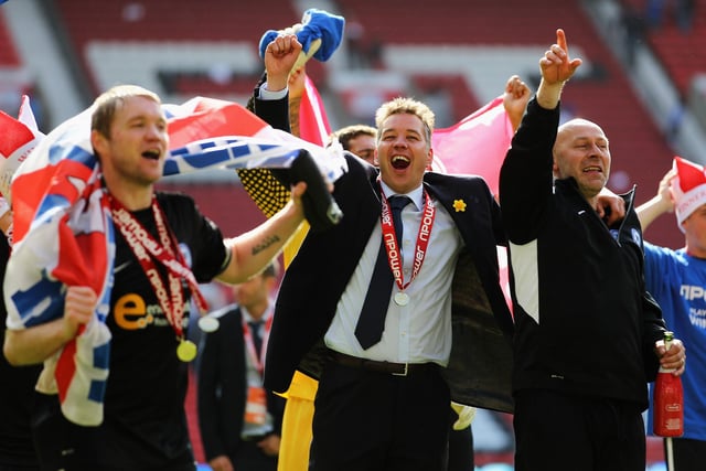 Peterborough Manager Darren Ferguson celebrates promotion in 2011 at a rather fitting Old Trafford venue.