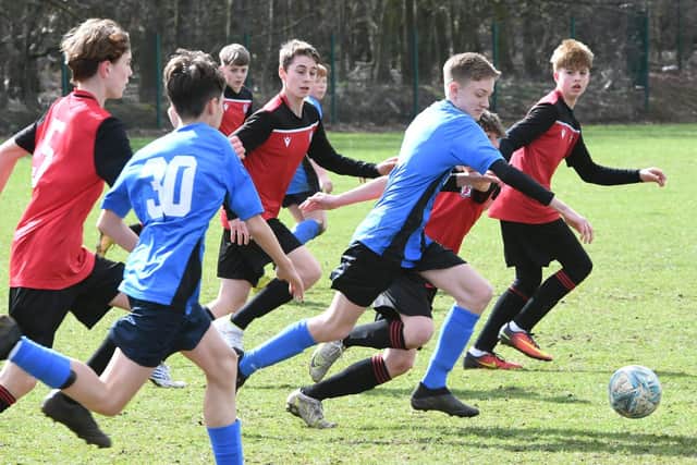 Action from Orton Rangers U14s v Whittlesey (blue) at Stonald Road. Photo: David Lowndes.