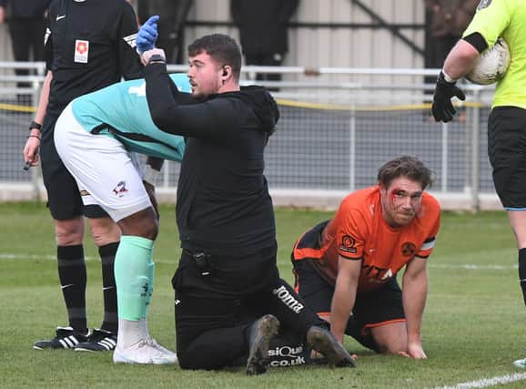 Peterborough Sports' skipper Mark Jones was forced out of the game against Scunthorpe with a nasty head injury. Photo: David Lowndes.