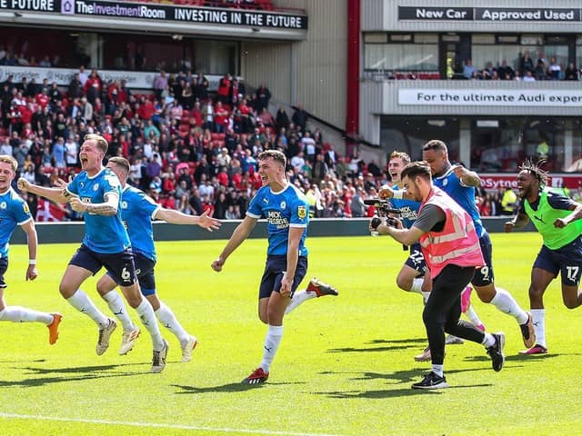 They're off! Posh players set off in celebration after they secured their play-off place at Barnsley last weekend. Photo: Joe Dent/theposh.com.