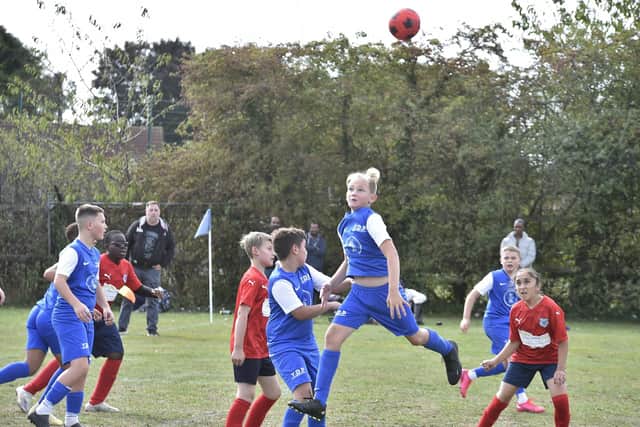 Youth Dreams Project U12's (blue) football action v Gunthorpe U12's at St John Fisher School. Photo: David Lowndes.