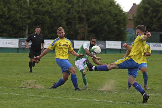 Hamza Akram shoots at goal for FC Peterborough Reserves against Sawtry.