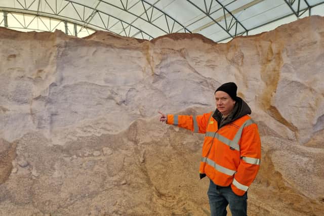 Cllr Angus Ellis in the huge grit warehouse
