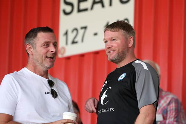 Posh chairman Darragh MacAnthony (left) and manager Grant McCann are relaxed about the new season. Photo: Joe Dent/theposh.com.