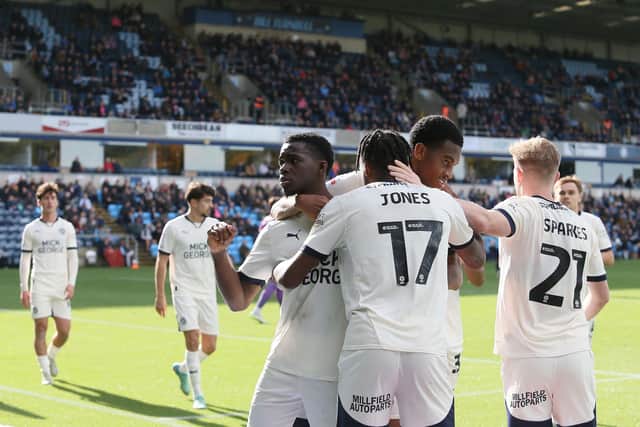 Posh celebrate their goal at Wycombe. Photo Joe Dent/theposh.com.