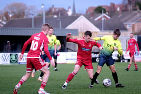 Action from Scarborough (red) v Peterborough Sports. Photo: Richard Ponter
