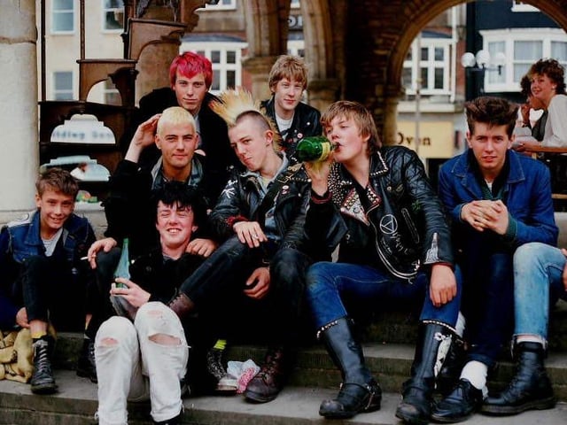 A group of youngsters enjoying a few 'light' refreshments under the Guildhall