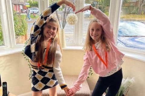 Ten-year-olds Abia Kisbee-Brown (L) and Darcy Gilbert are lending their voices to potential Christmas Number One, ‘This One’s for the Children’.
