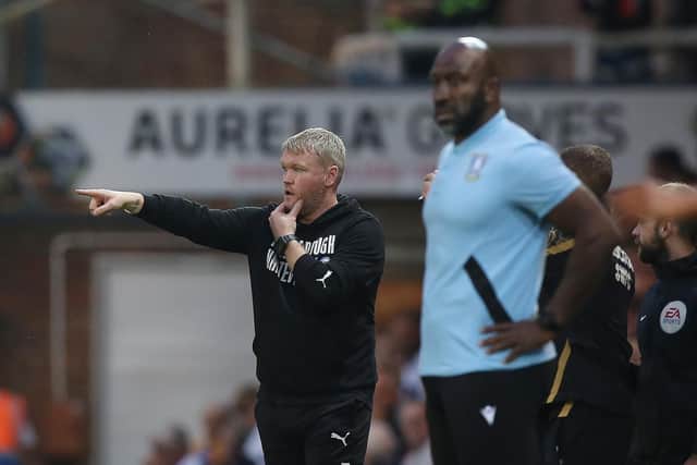 Rival managers Darren Moore (right) of Sheffield Wednesday and Grant McCann of Posh. Photo: Joe Dent/theposh.com.