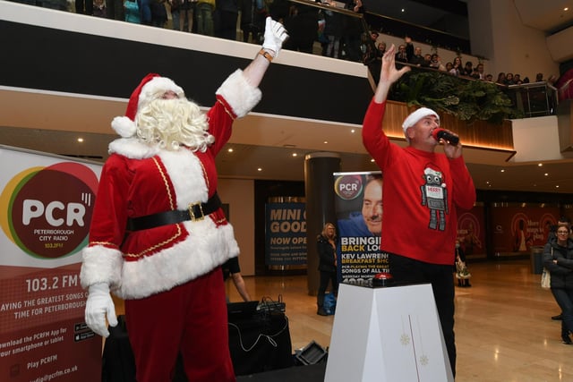 Father Christmas and Kev Lawrence switch on the Christmas lights at Queensgate.