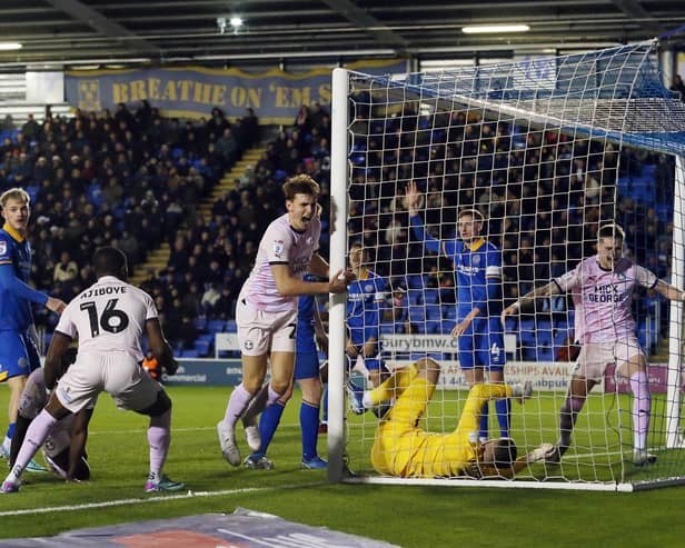 Hector Kyprianou (by post) of Peterborough United has just scored the winning goal against Shrewsbury Town. Photo: Joe Dent/theposh.com.