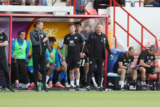 Manager Darren Ferguson looks on from the touchline. Photo: Joe Dent.