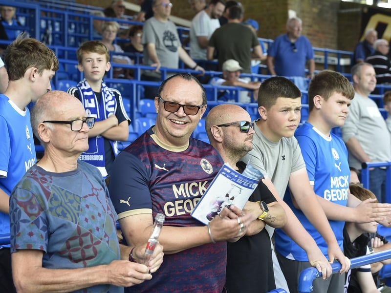 Peterborough United fans watch the draw with Leyton Orient.