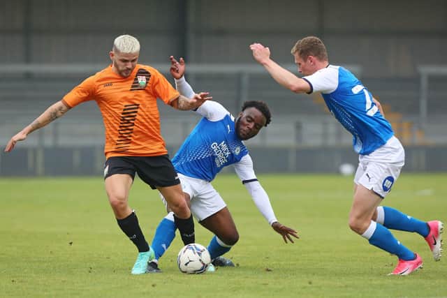 Hameed Ishola (centre) scored for Posh Under 21s at Long Buckby. Photo: Joe Dent/theposh.com.