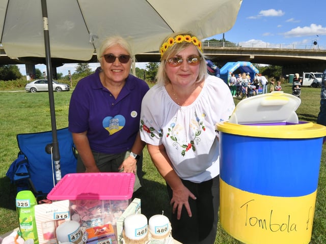 Ukraine Independence Day picnic at Orton Mere where Luba Kelly and Oksama Mauro are pictured running a tombola.