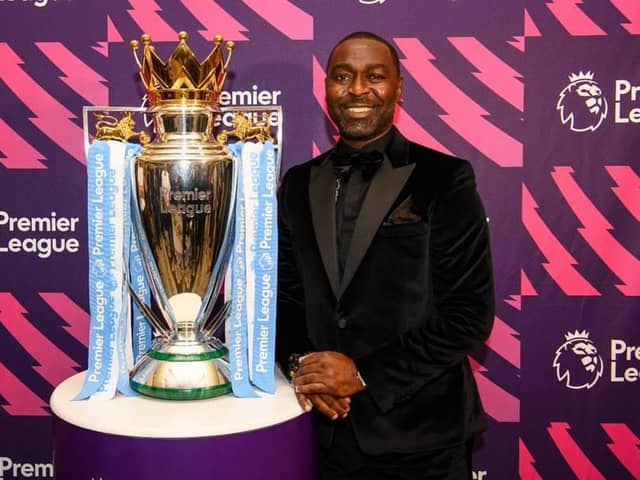 Andy Cole in front of the Premier League Trophy at last year’s gala dinner. Photo: Kidney Research UK.