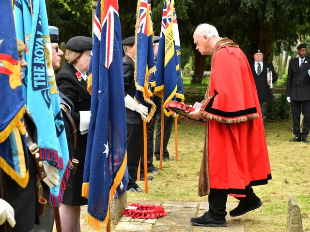 Mayor of Peterborough Nick Sandford lays a wreath
