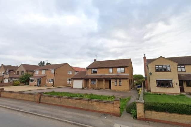 158 Stonald Road in Whittlesey, which stands in front of the strip of land where 19 new homes are planned