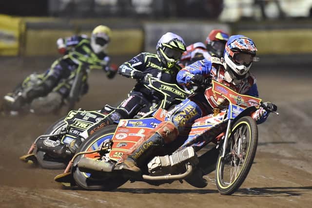 Chris Harris (red helmet) and Simon Lambert (blue) in action for Panthers against Ipswich in Heat Six. Photo: David Lowndes.