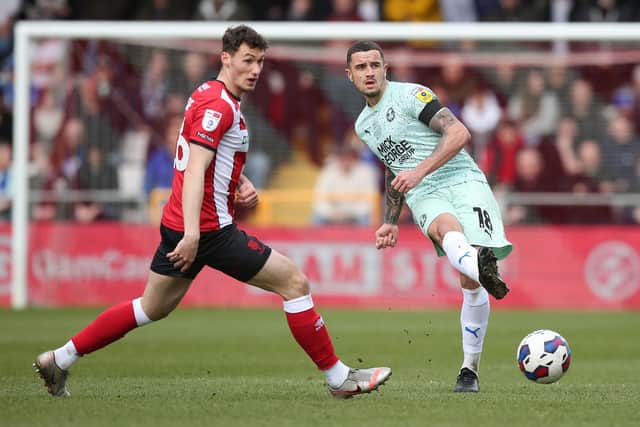 Oliver Norburn of Peterborough United in action at Lincoln. Photo: Joe Dent/theposh.com.