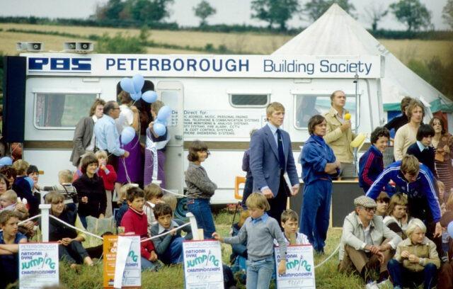 Local celebrity/boxer Dave “Boy” Green watches on during the Dyke Jumping Championships (yes, you read that right) held at Ferry Meadows in 1979.