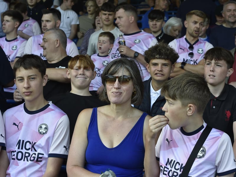 Peterborough United fans watch the draw with Leyton Orient.