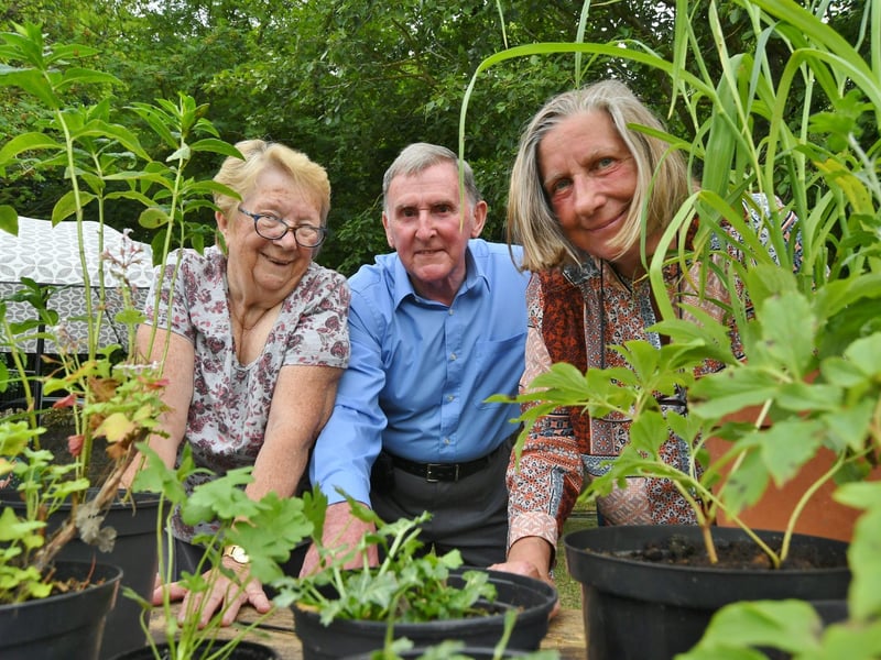 Eileen Ladds, Paul Burdock and Kate Trundle on the plant stall.