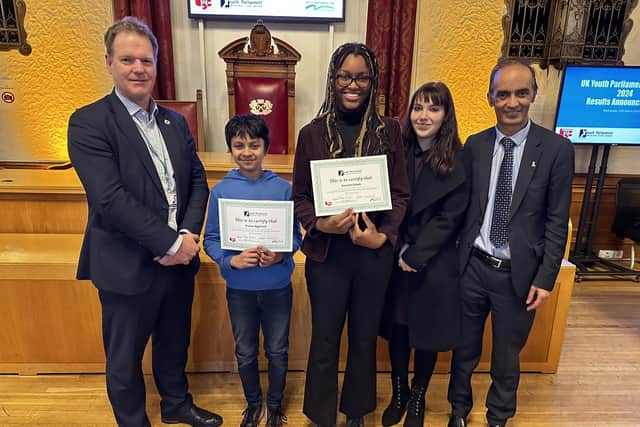 Peterborough's new Youth MPs Pranav Aggarwal (second from left) and Danielle Daboh (centre) with (left to right) Matt Gladstone, Chief Executive of Peterborough City Council, Eva Woods outgoing Youth MP and Cllr Mohammed Farooq, Leader of Peterborough City Council.