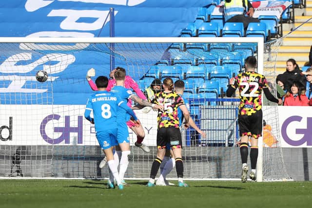 Jon Mellish (22) volleys his second goal of the game for Carlisle against Posh. Photo Joe Dent/theposh.com.