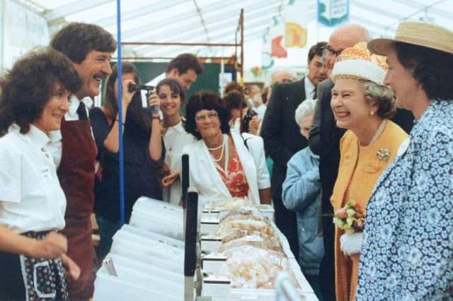 The Queen enjoys a joke at the East of England show in 1991.