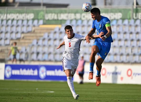 Ronnie Edwards battles for the ball in England U19s semi-final meeting with Italy at the European Championships. (Photo by JOE KLAMAR/AFP via Getty Images)