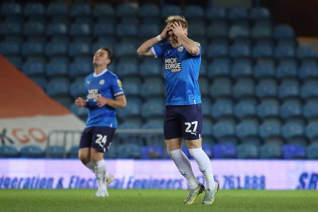 Joe Taylor of Peterborough United can't disguise his anguish after coming close to scoring against Chelsea. Photo: Joe Dent/theposh.com.