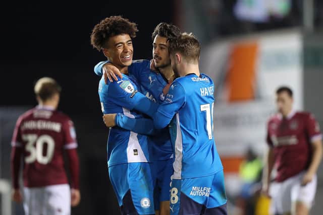 Posh celebrate Ryan De Havilland's goal against Cobblers. Photo Joe Dent/theposh.com