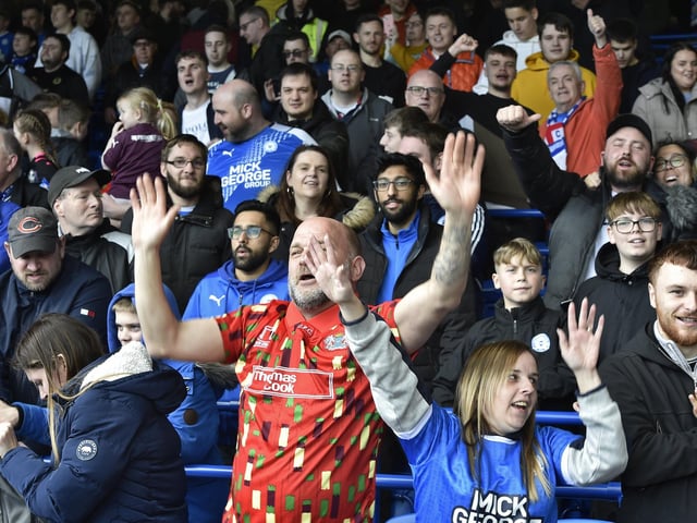 Posh 2 Derby 0
Peterborough United fans are pictured watching the crucial win over Derby County.
David Lowndes