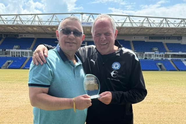Posh director of football Barry Fry, right, with his award and Gez Chetal, organiser of the Peterborough Community Business Awards.