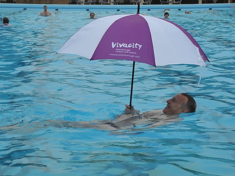 The weather isn't always great - but there will always be swimmers prepared for the wet conditions!