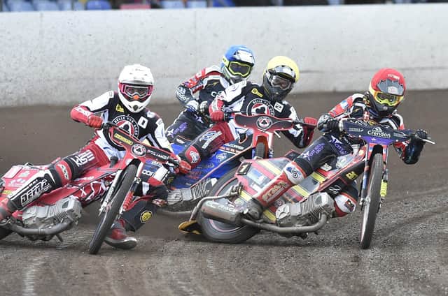 Panthers riders Michael Palm Toft (red helmet) and Chris Harris (blue) in action in the Premi8ership pairs event at the Showground. Photo: David Lowndes.